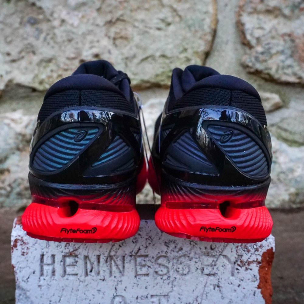 ASICS Women's MetaRide - Running shoes Black Red - Picture 4 of 10